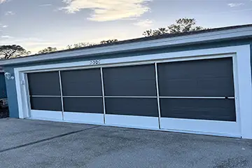 Garage screen door with track slider